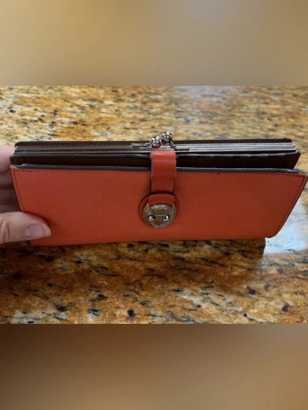 Tumi Orange and brown leather wallet